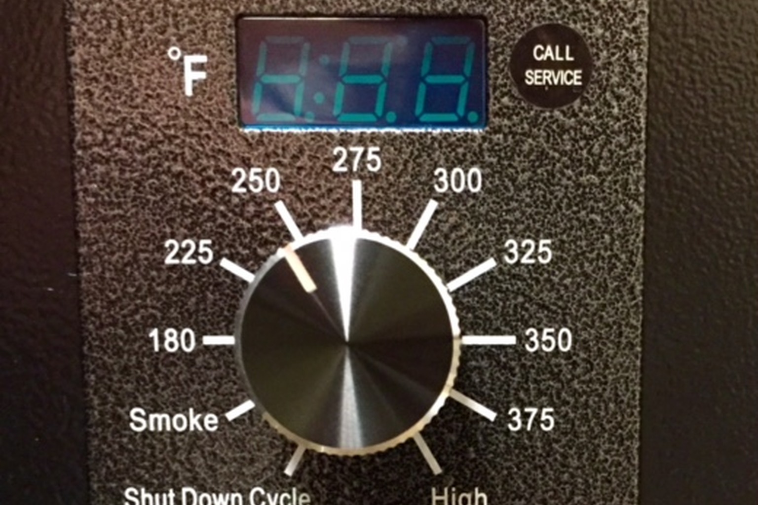 A pellet-grill temperature controller. The photograph does not establish WiFi capability.